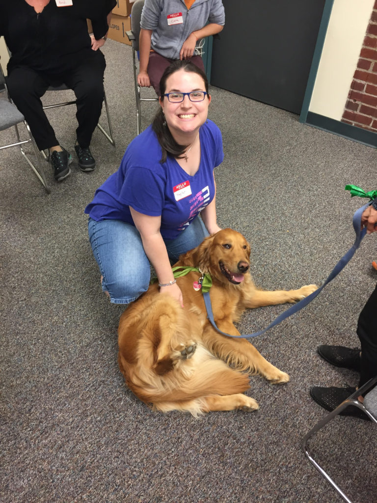 Nellie's schoolhouse student with a dog